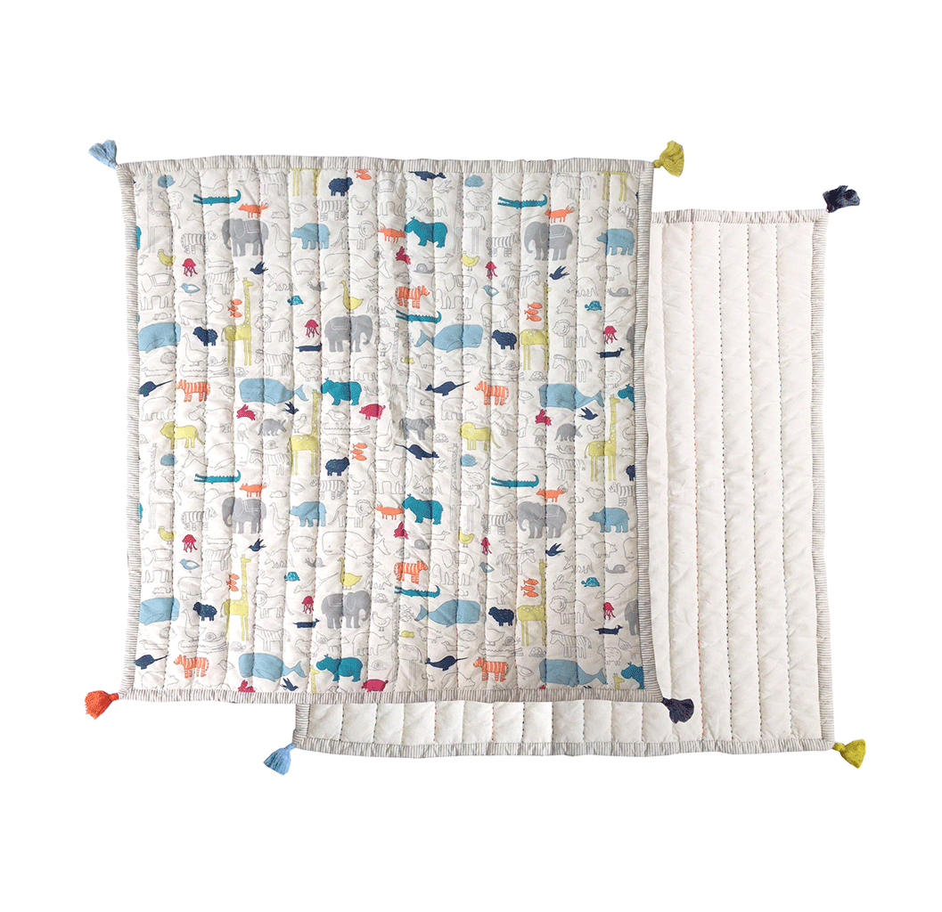 Pehr Multi Noah's Ark Blanket. Screen printed, cotton. White with animal print, reverse side plain white, coloured tassels on the corners.